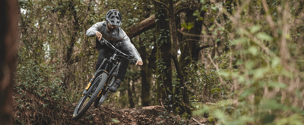 Haibike Hero Andrea Garibbo riding through a forest