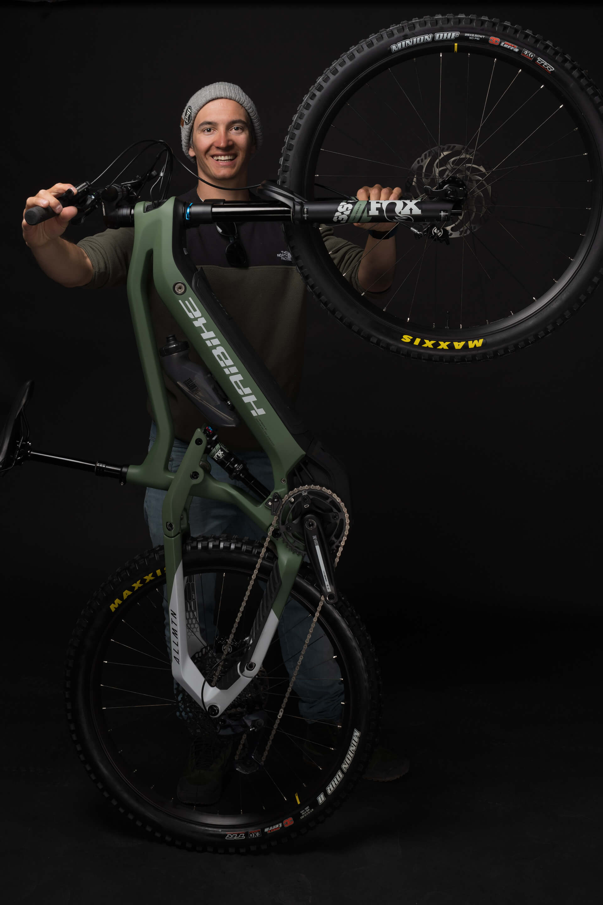 Portrait image of Haibike Hero Victor Delerue with his Haibike AllMtn 6 in front of a black background
