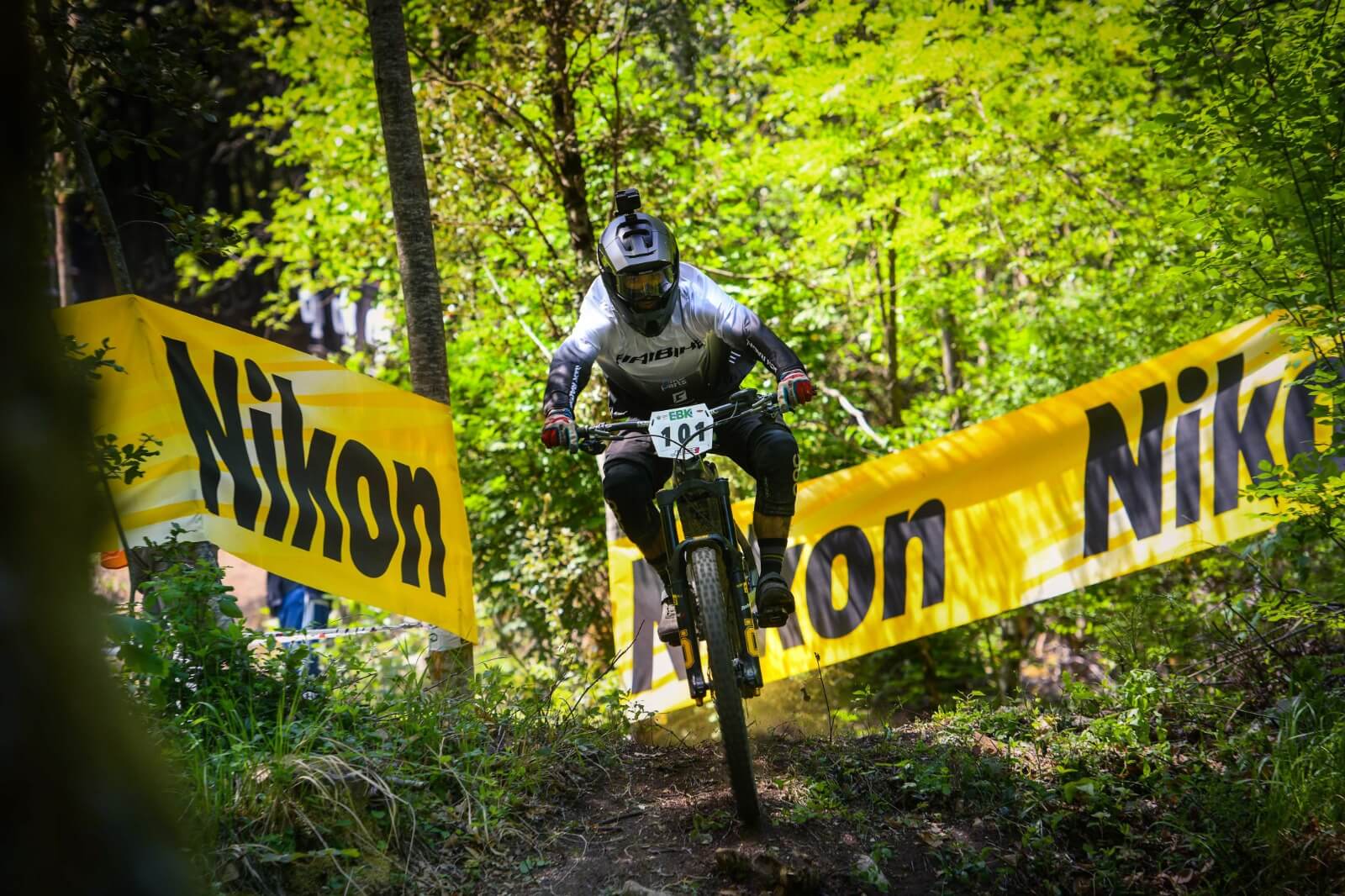 Haibike Hero Andrea Garibbo riding through a forest during the Enduro World Series